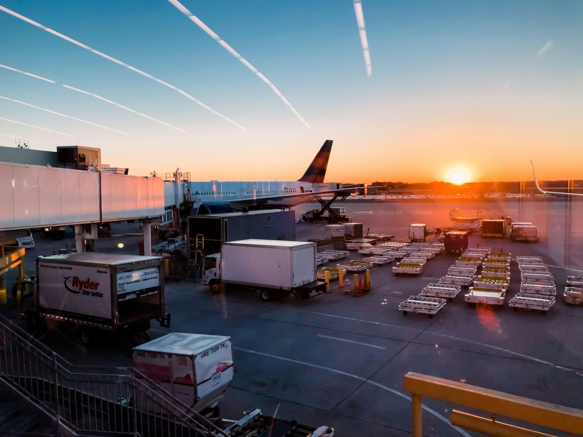 Aircraft being loaded at sunset